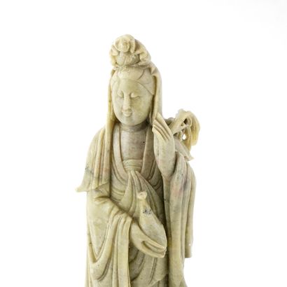 null GUANYIN 

Soapstone subject, representing Guanyin. 
China, 20th century

Total...
