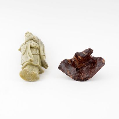 null GUANYIN 

Soapstone subject, representing Guanyin. 
China, 20th century

Total...