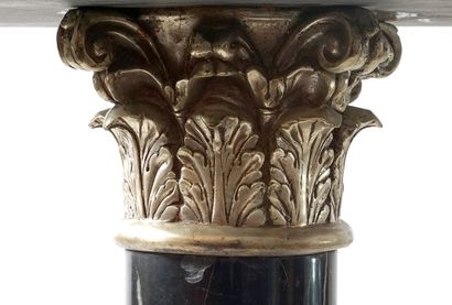 null MARBLE

Piedastal in dark marble. We can see a corynthian capital under the...