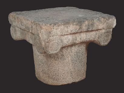 null Roman basalt ionic column capital, four-sided square top over a carved frieze...