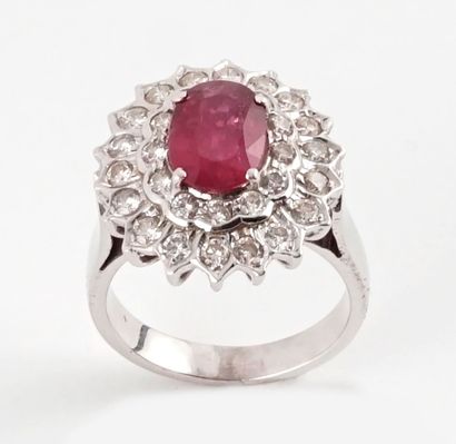 null 14K GOLD DIAMONDS
14K white gold ring set with an oval-cut treated ruby of approximately...