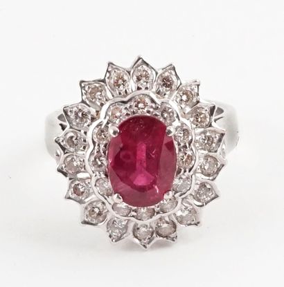 null 14K GOLD DIAMONDS
14K white gold ring set with an oval-cut treated ruby of approximately...