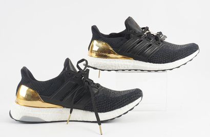 null Adidas - UltraBOOST LTD
Pointure : US 10 Men - EU 44
Couleur : Noir, doré
Référence...