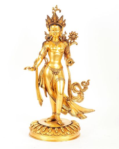 AVALOKITESHVARA

Figure en cuivre doré d'Avalokiteshvara....