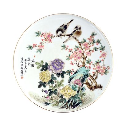 null CHANG SHIH-PAO (1909-1987)

A Famille rose signature dish decorated with Spring...