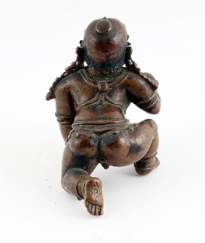 null PÉRIODE MING / MING PERIOD

Bronze subject, representing a young woman holding...