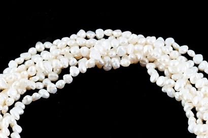 null PEARLS
Necklace composed of 8 rows of freshwater pearls, 10K and 14K yellow...