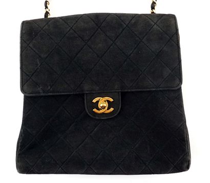 CHANEL 
Black suede bag by Chanel. 
Width:...