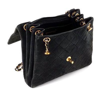 null CHANEL 
Black suede bag by Chanel. 
Width: 24cm - 9 1/2".
Height: 23cm - 9 ...
