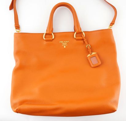 PRADA 
Bag signed Prada in orange leather....