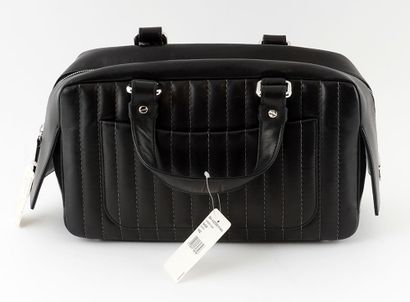 null CHANEL 
Black camera bag by Chanel. 
Width: 31cm - 12 1/4"
Height: 20cm - 7...