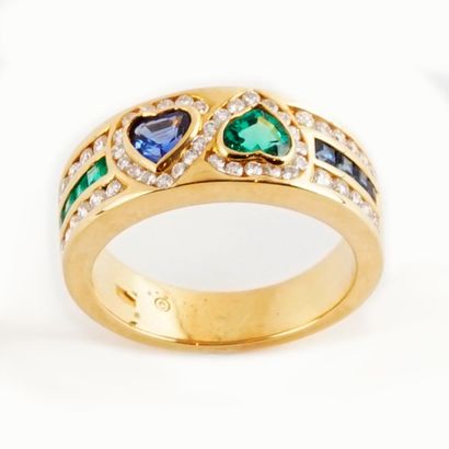 null 18K GOLD TANZANITES EMERALDS DIAMONDS
18K yellow gold ring adorned with two...