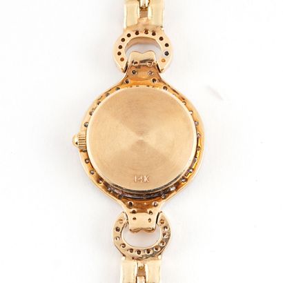 null GENEVA14K GOLD
Lady's wristwatch in 14K gold, round case of approximately 21mm,...