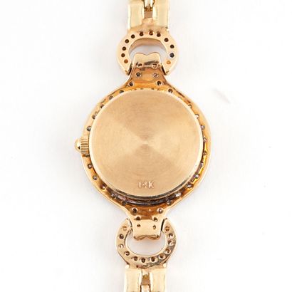 null GENEVA 14K / GENEVA14K GOLD
Montre-bracelet de dame en or 14K, boîtier rond...