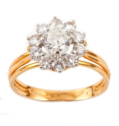 18K GOLD, DIAMOND
Flower ring in 18K yellow...