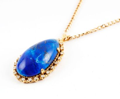 null 18K GOLD, LAPIS LAZULI
18K yellow gold pendant set with a pear-shaped lapis...