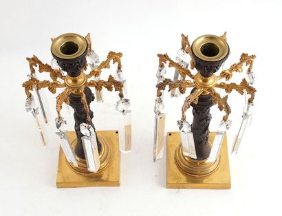 null VIGNES / GRAPE VINE
Pair of bronze and bronze-gilt torches decorated with vines....
