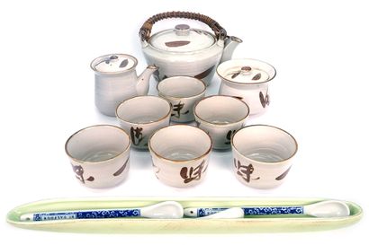 null JAPAN

Beige and brown enameled ceramic tea set, including 6 cups, a jug, a...