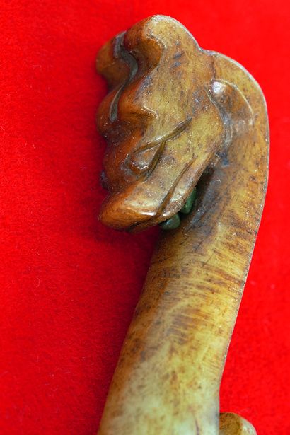 null CHINA

Celadon serpentine fibula, in the shape of a stylized dragon. Modern...