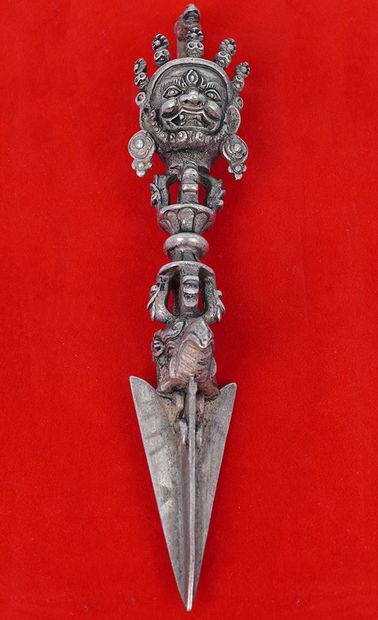 null TIBET

Metal phurbu, the tip decorated with a garuda beak and topped with a...