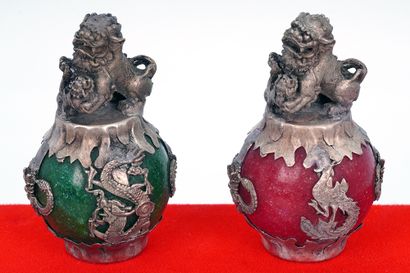 null CHINA

Two small subjects in glass and metal, each topped with a Buddhist lion...