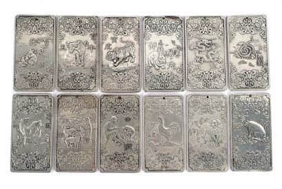 null CHINA

Lot of twelve silver-plated plates representing respectively the twelve...