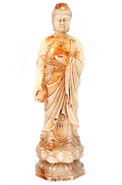 null CHINA

Alabaster sculpture, representing the Buddha standing on a double lotus,...
