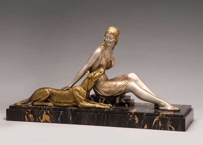 CHIPARUS, Demeter H. (1886-1947) Femme et chien Marbre et bronze à patine dorée Signé...