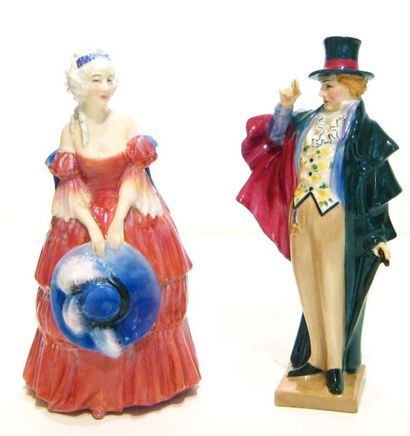 ROYAL DOULTON Paire de figurines en porcelaine polychrome anglaise, « The Corinthian...