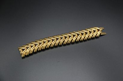null Bracelet en or jaune 750 millièmes à maillons stylisés - 68.18 g / L. 19 cm...