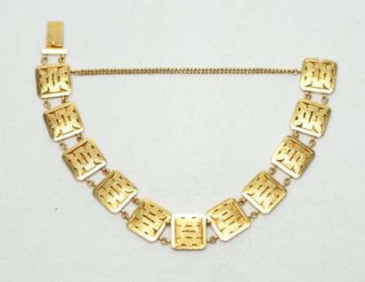 null Bracelet en or jaune à onze maillons carrés stylisés Extrême Orient, avec chaînette...