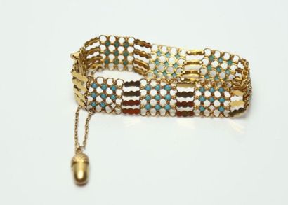 null Bracelet en or jaune 585 à motif stylisé et pierres bleues, avec chaînette à...