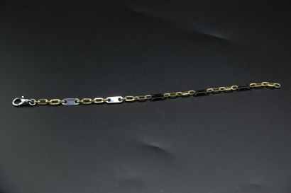 null Bracelet en or jaune et acier - 7,52 g / L. 21 cm
