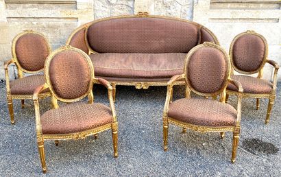 null Salon fin Louis XVI en bois doré comprenant quatre fauteuils à dossier médaillon...