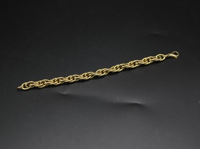 null Bracelet en or jaune 750 millièmes, à maillons entrelacés stylisant une corde...