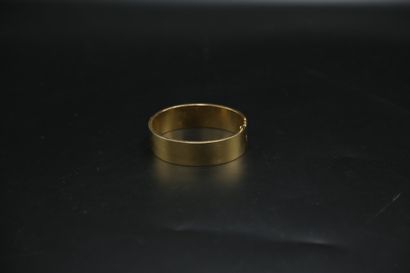 null Bracelet jonc ouvrant en or jaune 750 millièmes. Poinçon hibou. 

38,40 g 

Dimensions...