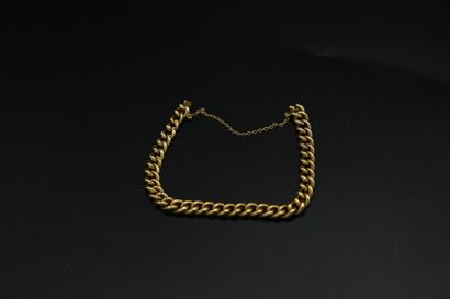 null Bracelet en or jaune 750 millièmes maille gourmette avec chaînette de sécurité...