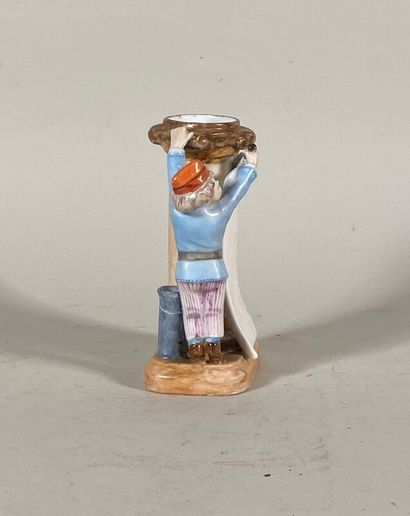 null Porcelain menu holder decorated with a boy with a brush on a column

H. 15,5...
