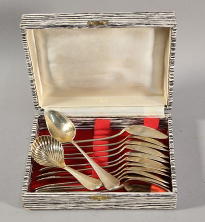 null Twelve teaspoons and a sugar scoop in vermeil, model with non-monogrammed medallion...