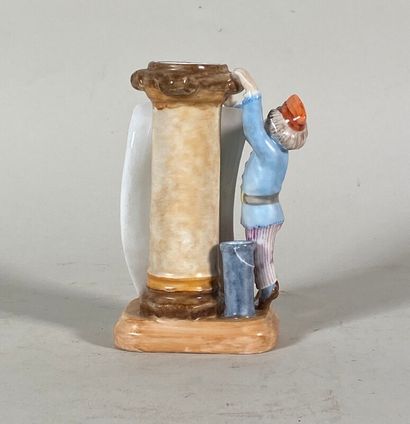 null Porcelain menu holder decorated with a boy with a brush on a column

H. 15,5...
