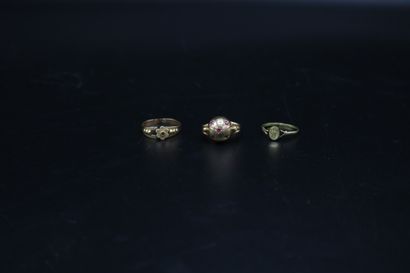 null Three small rings: one dome with pink stones in a star setting and two others...
