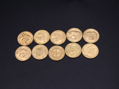 null * Dix pièces de 20 francs or - 64,61 g