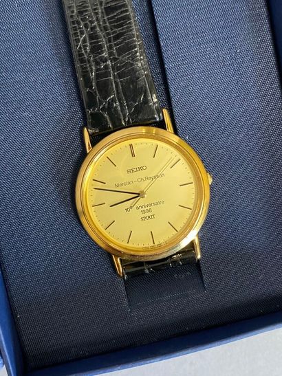 null SEIKO, montre bracelet boitier métal doré modèle Spirit marqué 10e anniversaire...