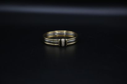 null Bracelet jonc en deux tons d'or (750), orné de quartoze diamants d'environ 0.01...