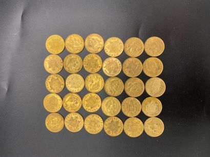 null * Trente pièces de 20 francs or - Napoléon III tête laurée - Poids : 193,06...