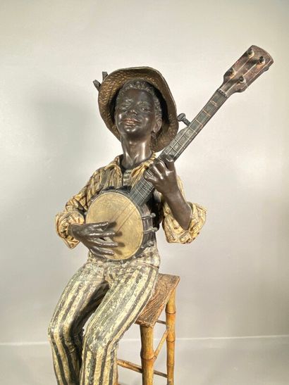 null Goldscheider, dans le goût de,

Jeune homme au chapeau jouant du banjo assis...
