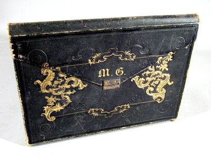 null * 224. [Early 19th century wallet]. Black morocco wallet monogrammed "M. G.",...