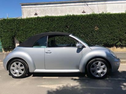 null VOLKSWAGEN New-Beetle du 04/06/2003, cabriolet 1L6 essence de couleur gris métallisé,...