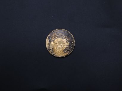 null Pièce en or de 20 dollars Liberté 1904 - 33.5 g

Trace d'encre sur l'avers,...