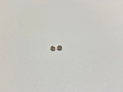 null Deux diamants ronds brillants sur papier : 0.09 ct et 0.10 ct